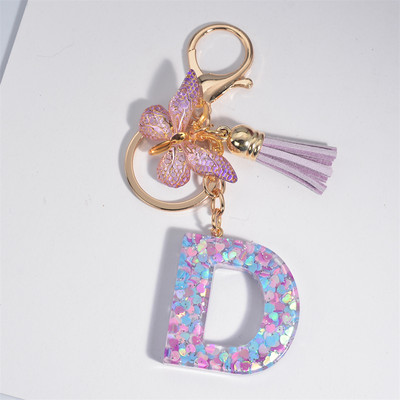 Μπρελόκ με αρχικό γράμμα για γυναίκες Φούντα πεταλούδα μωβ Χαριτωμένο μπρελόκ αυτοκινήτου για γυναικεία κοριτσίστικα πορτοφόλια στολίδια σακίδιο πλάτης