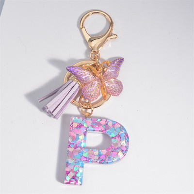 Μπρελόκ με αρχικό γράμμα για γυναίκες Φούντα πεταλούδα μωβ Χαριτωμένο μπρελόκ αυτοκινήτου για γυναικεία κοριτσίστικα πορτοφόλια στολίδια σακίδιο πλάτης