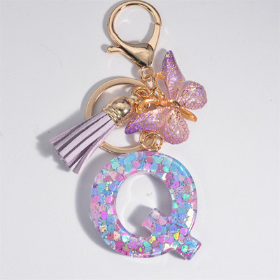 Μπρελόκ με αρχικό γράμμα για γυναίκες Φούντα πεταλούδα μωβ Χαριτωμένο μπρελόκ αυτοκινήτου για γυναικεία κοριτσίστικα πορτοφόλια στολίδια σακίδιο πλάτης