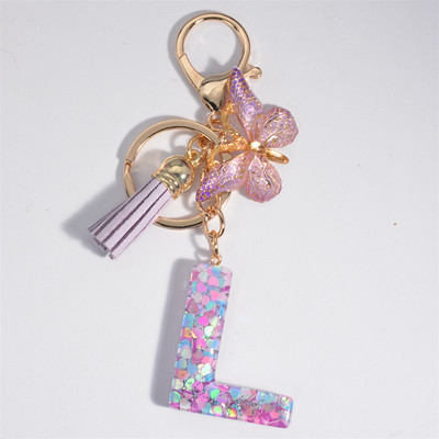 Μπρελόκ με αρχικό γράμμα για γυναίκες Φούντα πεταλούδα μωβ Χαριτωμένο μπρελόκ αυτοκινήτου για γυναικεία κοριτσίστικα πορτοφόλια στολίδια σακίδιο πλάτης