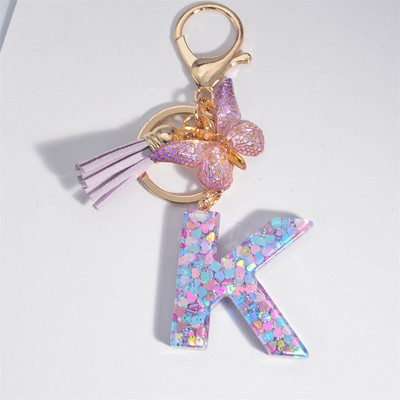 Μπρελόκ με αρχικό γράμμα για γυναίκες Φούντα πεταλούδα μωβ Χαριτωμένο μπρελόκ αυτοκινήτου για γυναικεία κοριτσίστικα πορτοφόλια στολίδια σακίδιο πλάτης