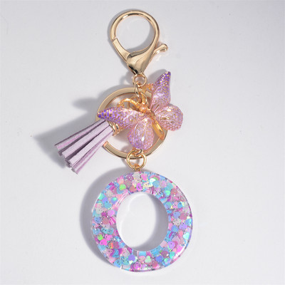 Μπρελόκ με αρχικό γράμμα για γυναίκες Φούντα πεταλούδα μωβ Χαριτωμένο μπρελόκ αυτοκινήτου για γυναικεία κοριτσίστικα πορτοφόλια στολίδια σακίδιο πλάτης