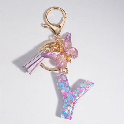 Μπρελόκ με αρχικό γράμμα για γυναίκες Φούντα πεταλούδα μωβ Χαριτωμένο μπρελόκ αυτοκινήτου για γυναικεία κοριτσίστικα πορτοφόλια στολίδια σακίδιο πλάτης