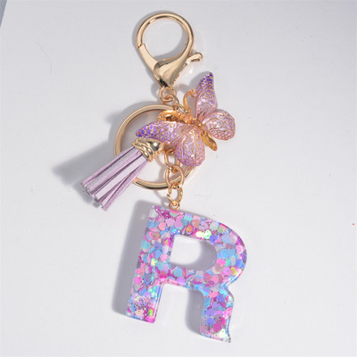 Μπρελόκ με αρχικό γράμμα για γυναίκες Φούντα πεταλούδα μωβ Χαριτωμένο μπρελόκ αυτοκινήτου για γυναικεία κοριτσίστικα πορτοφόλια στολίδια σακίδιο πλάτης