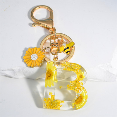 Armas 26 Initial A kuni Z Mesilaste võtmehoidja kuivlillevaigust päevalilleripatsiga võtmehoidja naistele auto võtmehoidja käekoti tarvikud