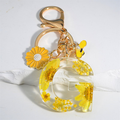 Armas 26 Initial A kuni Z Mesilaste võtmehoidja kuivlillevaigust päevalilleripatsiga võtmehoidja naistele auto võtmehoidja käekoti tarvikud