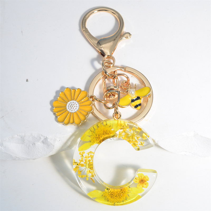 Armas 26 Initial A kuni Z Mesilaste võtmehoidja kuivlillevaigust päevalilleripatsiga võtmehoidja naistele auto võtmehoidja käekoti tarvikud