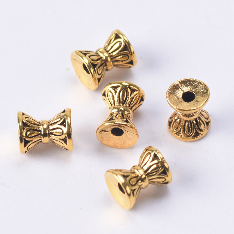 Σχήμα κλεψύδρας Αντίκα Χρυσό Χρώμα Θιβετιανό Ασημί 6,5x5,5 χιλιοστά Χαλαρές Μεταλλικές Χάντρες Αποστάτης Παρτίδα για κοσμήματα που φτιάχνουν DIY χειροτεχνίες