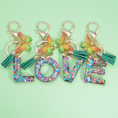 Butterfly kiri võtmehoidja käsitsi valmistatud tilkuva liim 26 inglise kirjaga auto rahakott Aksessuaarid Naiste kott ripats kaunistused kingitus