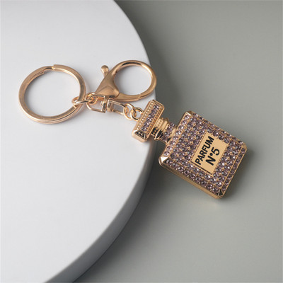 Κρεμαστό μπρελόκ σε σχήμα μπουκαλιού άρωμα πολυτελείας Rhinestone Κρυστάλλινο Γυναικείο Μπρελόκ Γυναικεία τσάντα στολίδια αυτοκινήτου Δώρα για πάρτι