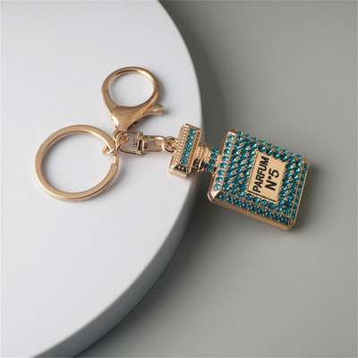 Κρεμαστό μπρελόκ σε σχήμα μπουκαλιού άρωμα πολυτελείας Rhinestone Κρυστάλλινο Γυναικείο Μπρελόκ Γυναικεία τσάντα στολίδια αυτοκινήτου Δώρα για πάρτι