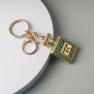 Κρεμαστό μπρελόκ σε σχήμα μπουκαλιού άρωμα πολυτελείας Rhinestone Κρυστάλλινο Γυναικείο Μπρελόκ Γυναικεία τσάντα στολίδια αυτοκινήτου Δώρα για πάρτι