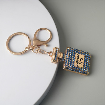 Κρεμαστό μπρελόκ σε σχήμα μπουκαλιού άρωμα πολυτελείας Rhinestone Κρυστάλλινο Γυναικείο Μπρελόκ Γυναικεία τσάντα στολίδια αυτοκινήτου Δώρα για πάρτι