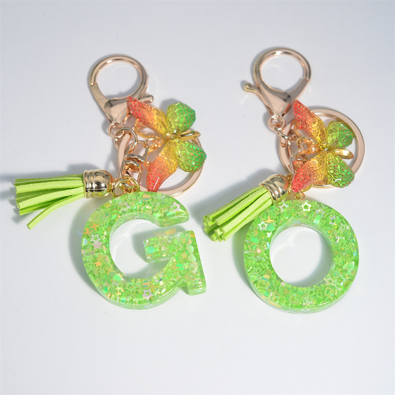 Mood 26 Algtähestikuline võtmehoidja roheline liblikas tutiga võtmehoidja Star Love Fill võtmehoidja naiste kott ripats auto võtmehoidja
