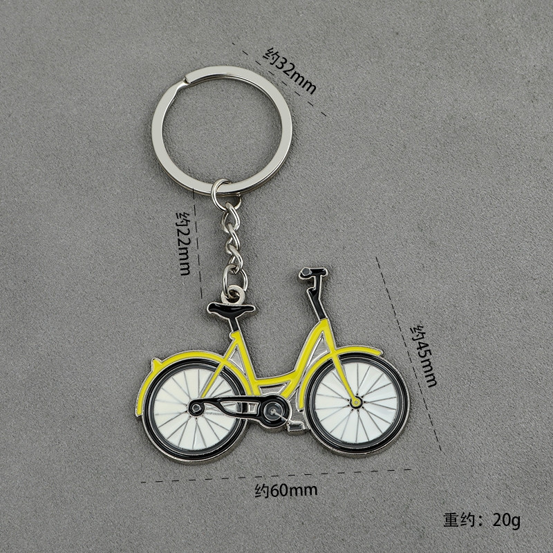 Kreatív sárga kerékpáros kulcstartó dinamikus kerékpárfigura kulcstartó diák iskolatáska medál sportszurkolóknak ajándékok férfi autós kulcstartó