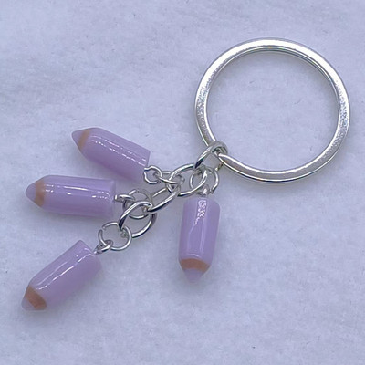 Uus värvipliiatsiga võtmehoidja Õpilasest õpetajast maalija pross ja mõned kingitused neile, kes kunstiga kokku puutuvad