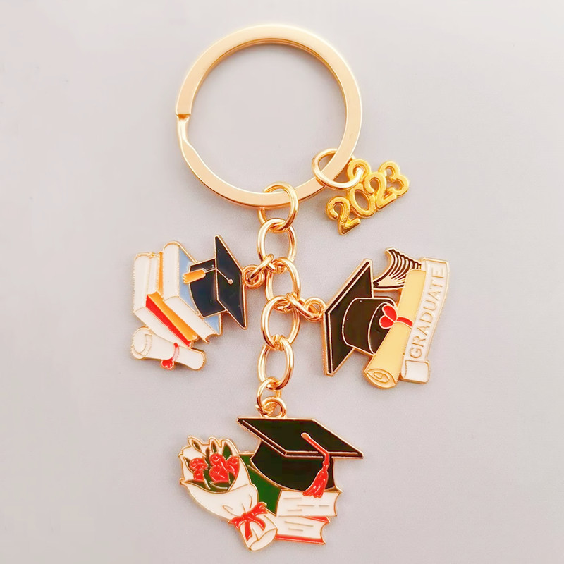 2023. aasta koolilõpukleidi müts Võtmehoidja sõrmus Üliõpilastele Naiste Ehted Isikupärastatud aksessuaarid Moodripatsid Kingitused igavesti