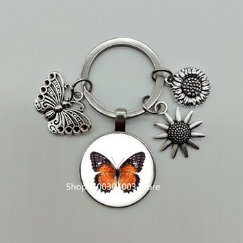 Νέο Μπρελόκ Butterfly Flower Keychain Glass Cabochon Γυναικεία μόδα Κοσμήματα Υψηλής ποιότητας Διακόσμηση αυτοκινήτου Μπρελόκ Παιδικά