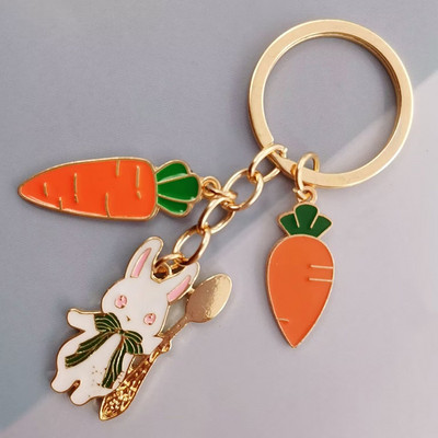 Hot akció zománcozott nyúl retek kulcstartó állat kulcstartó divat ékszer táska kiegészítő ajándék