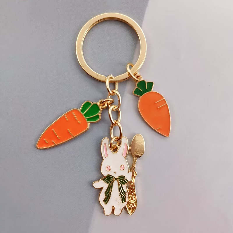 Hot akció zománcozott nyúl retek kulcstartó állat kulcstartó divat ékszer táska kiegészítő ajándék