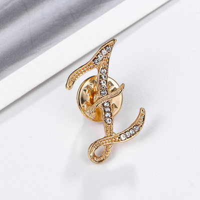 Uued Rhinestone`i kristallist prossid kullavärvi 26 inglise kirjaga revääridega särk Kleit rinnamärk Moeehted naistele Aksessuaarid