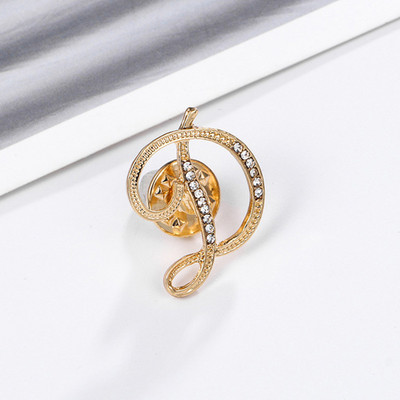 Uued Rhinestone`i kristallist prossid kullavärvi 26 inglise kirjaga revääridega särk Kleit rinnamärk Moeehted naistele Aksessuaarid