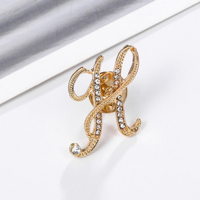 Uued Rhinestone`i kristallist prossid kullavärvi 26 inglise kirjaga revääridega särk Kleit rinnamärk Moeehted naistele Aksessuaarid