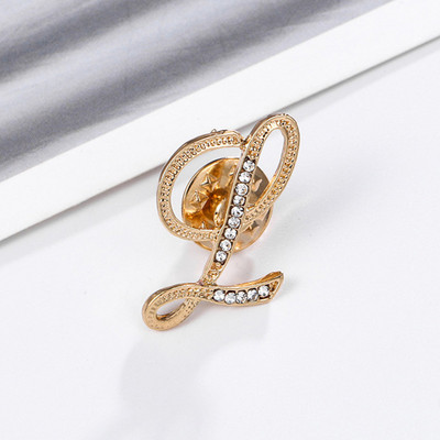 Uued Rhinestone`i kristallist prossid kullavärvi 26 inglise kirjaga revääridega särk Kleit rinnamärk Moeehted naistele Aksessuaarid