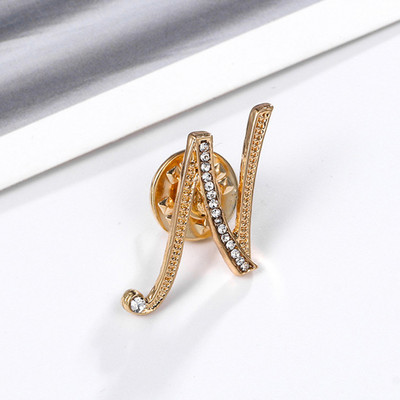 Uued Rhinestone`i kristallist prossid kullavärvi 26 inglise kirjaga revääridega särk Kleit rinnamärk Moeehted naistele Aksessuaarid