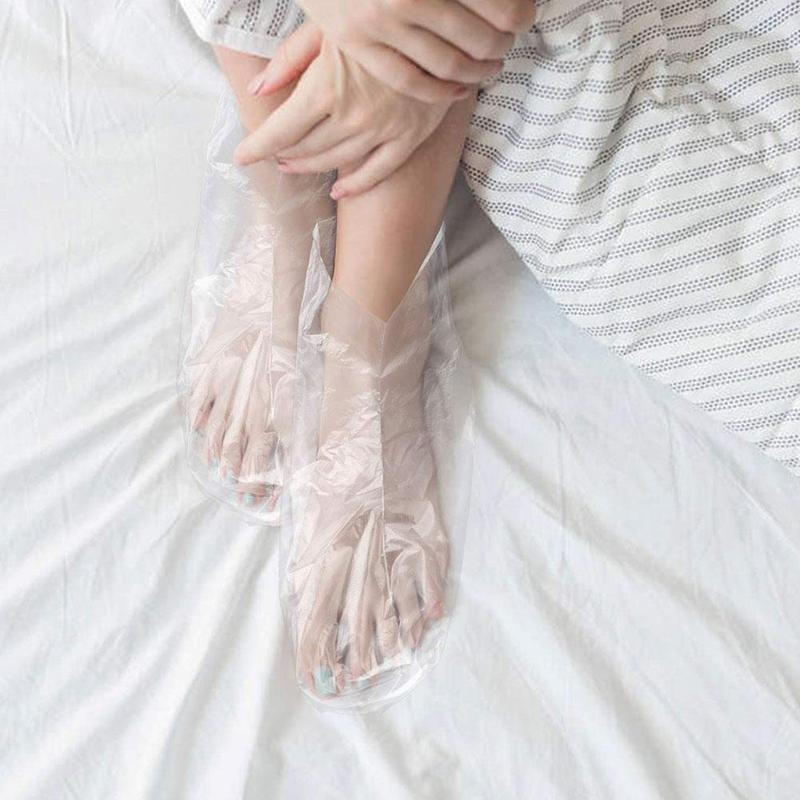 100db Eldobható műanyag lábvédők átlátszó cipőtakarók paraffinos fürdőviasz SPA terápiás táskák bélés cipók