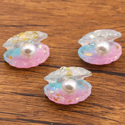 10 tk 22 * 22 mm armsad värvilised plaaditud pärlkarbid, lamedad tagaküljed vaigust kabošonid.