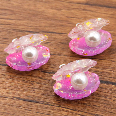 10 tk 22 * 22 mm armsad värvilised plaaditud pärlkarbid, lamedad tagaküljed vaigust kabošonid.