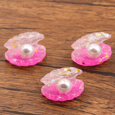 10 tk 22 * 22 mm armsad värvilised plaaditud pärlkarbid, lamedad tagaküljed vaigust kabošonid.