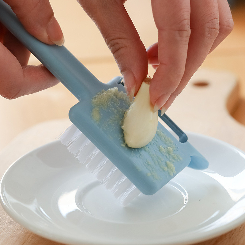 1 vnt. Daugiafunkcis vaisių ir daržovių valymo šepetėlis 5 viename skustukas kamščiatraukis česnakų smulkintuvas bulvių austrių švaraus šepečio virtuvės įrankis