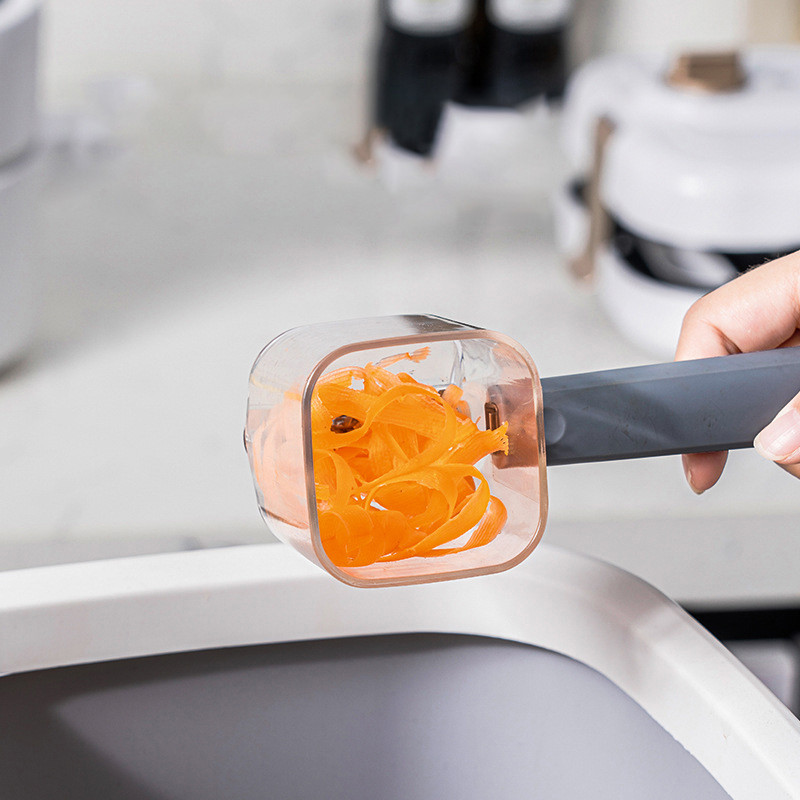 Köögiviljakoorija konteineriga kartuli porgandi purustajad köögiviljade koorija roostevabast terasest viilutaja koorimisnuga vidinad