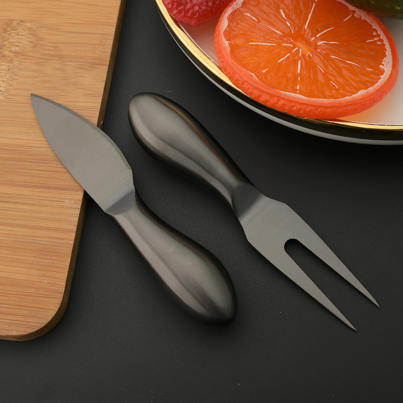 Must matt juustunugade komplekt Kvaliteetne roostevabast terasest käepidemega mitmeotstarbeline jagaja juustunuga või spaatliga juustuviilutaja