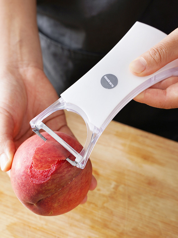 Puuviljakoorija koduköögitask Multifunktsionaalne köögiviljakartulikoorija õunakoorija kraapimiskoorija Pöörake koorimisnuga