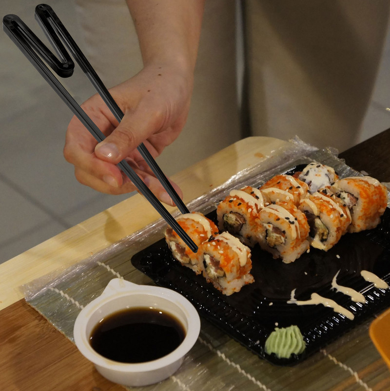 1 paar sõrmega söögipulgad Mängumängija suupistete söögipulgahoidja plastikust mängusõrmekomplektid Mängukontrolleri koolitus, õppepulgad