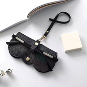 2023. aasta üliõhukesed populaarsed prillide ümbrised Lihtsad, klõpsatavad prillid, PU-nahast prillikottid, kaasaskantavad päikeseprillide hoiukarbid