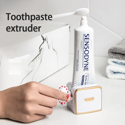 1tk Vannitoatarvikud Automaatne hambapasta pigistamine Jälgijätmata konksuga kleepuv hambapasta pigistamise seade rull-hambahari
