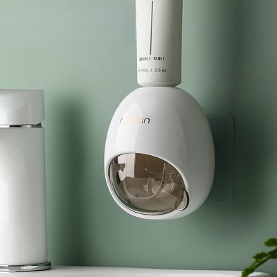 Seinale kinnitatav majapidamises kasutatav automaatne hambapasta pressimismasin Vannitoa väikesed tarvikud