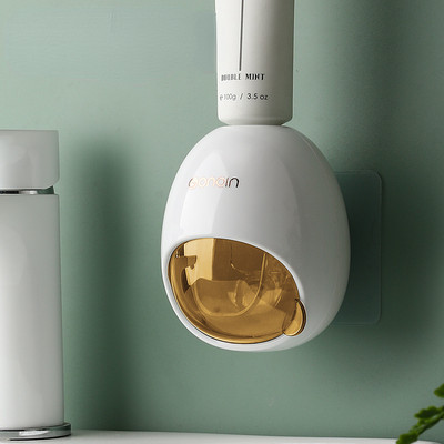 Seinale kinnitatav majapidamises kasutatav automaatne hambapasta pressimismasin Vannitoa väikesed tarvikud