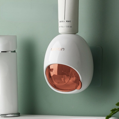 Seinale kinnitatav majapidamises kasutatav automaatne hambapasta pressimismasin Vannitoa väikesed tarvikud