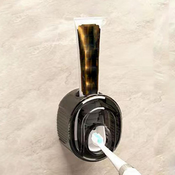 Поставка за паста за зъби Мултифункционален дозатор за паста за зъби Противоплъзгащ се монтиран на стена държач за паста за зъби Семеен аксесоар
