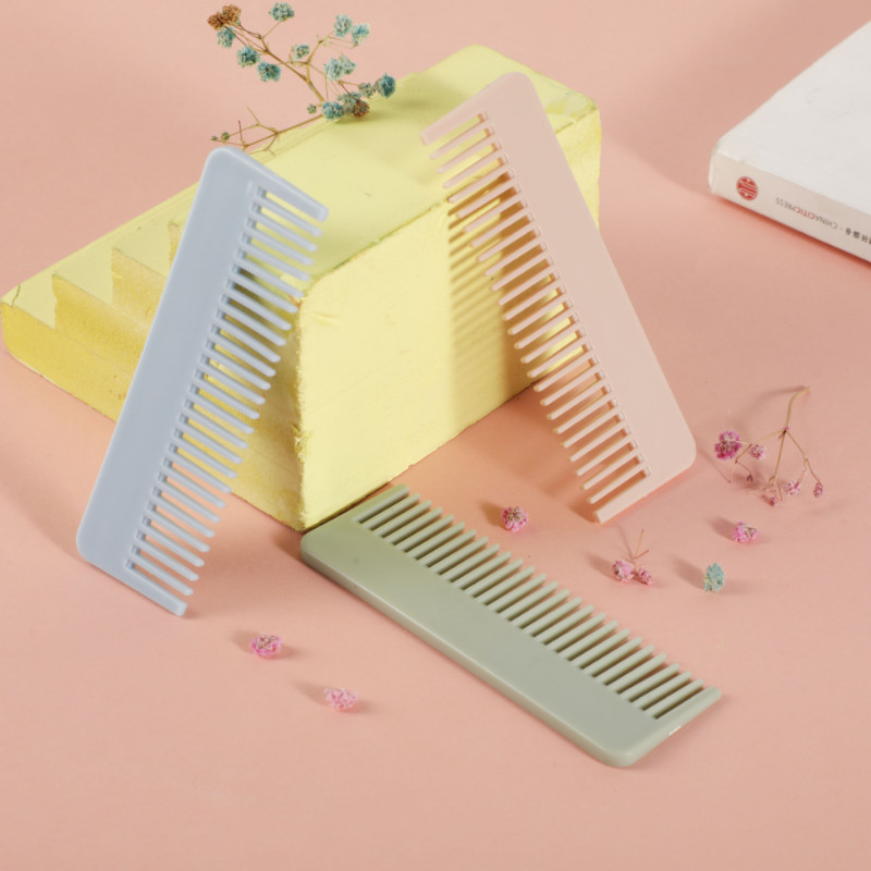 Novi slatki plastični češalj Mali prijenosni mini kozmetički češalj Putni jednostavan za nošenje Mali češalj Alati za kosu Kozmetički alati Brijač