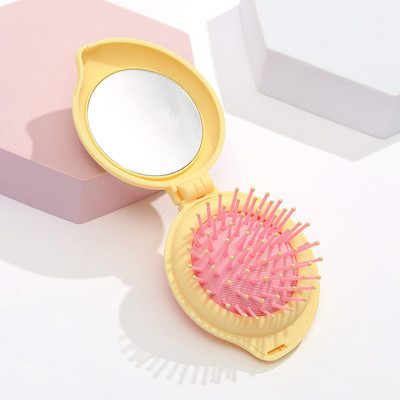 Armas virsikukujuline kokkupandav kamm tüdrukutele tasku juuksehari väike kamm peegliga kaasaskantava reisipea massaaži kokkupandav kamm