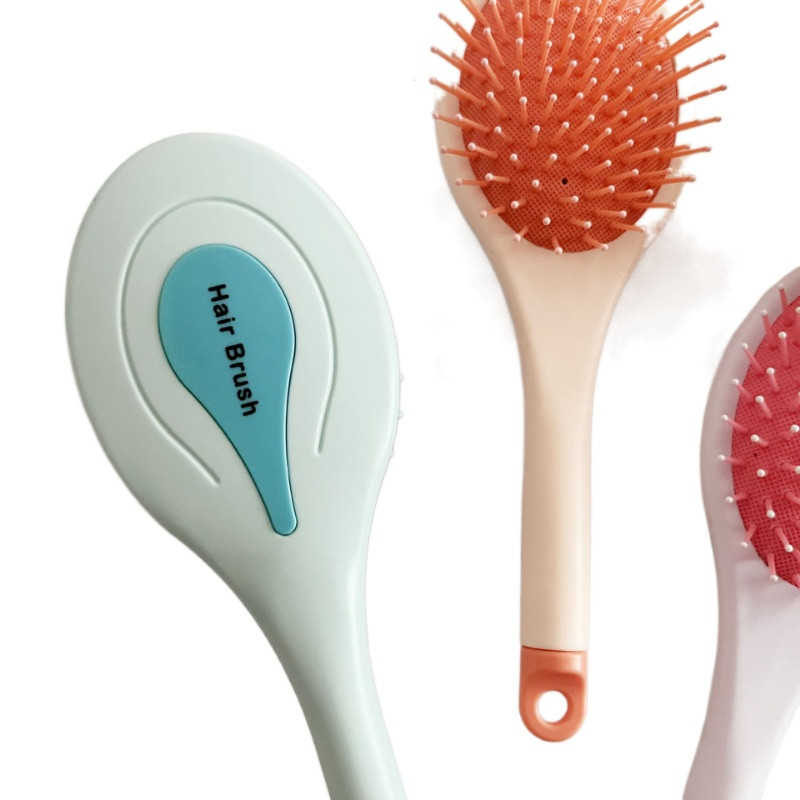 2023 új légpárnás fésű színes hajkiegyenesítő fésű, hosszú nyelű hajfésű hajkefe formáló hajeszközök