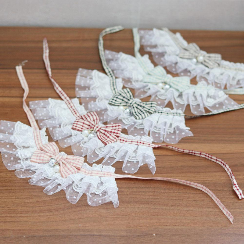 UUS Lemmikkassi pitsist süljerätik kellukesega Pehme hingav pleediga trükkimine Pudipõlled Lemmikkostüümide tarvikud