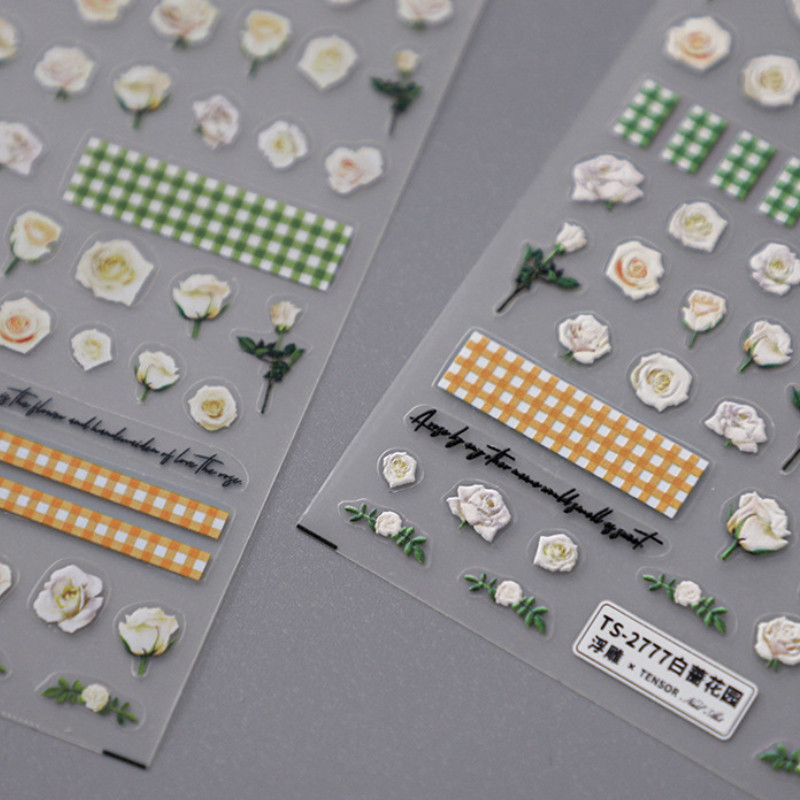 Valged roosiõied 5D pehmed reljeefsed reljeefid Isekleepuvad küünekleebised Kollase rohelise ruudulise mustriga 3D maniküüri kleebised