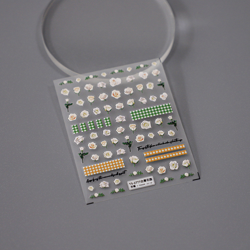 Valged roosiõied 5D pehmed reljeefsed reljeefid Isekleepuvad küünekleebised Kollase rohelise ruudulise mustriga 3D maniküüri kleebised